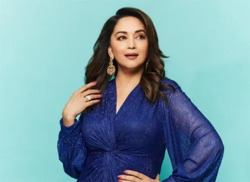 তোপের মুখে মাধুরী দীক্ষিত