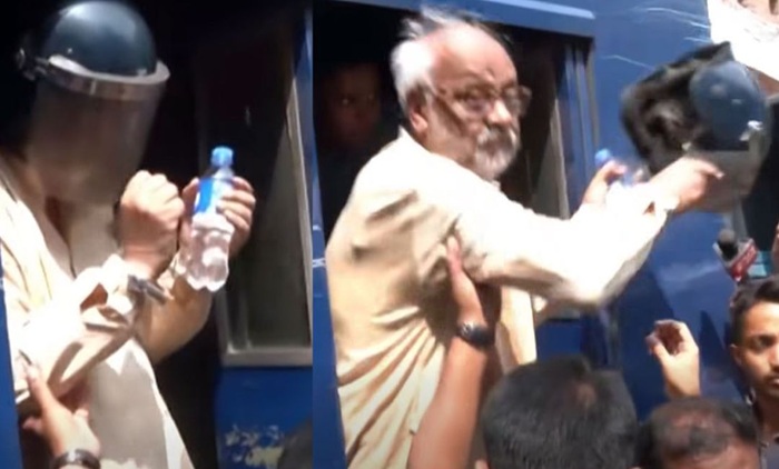 আদালত চত্বরে হাতকড়া পরতে অস্বীকৃতি ও হেলমেট ছুড়ে ফেললেন আখতারুজ্জামান