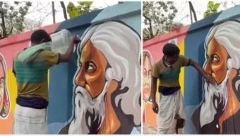 রবীন্দ্রনাথের গ্রাফিতিতে দেওয়া কালি মুছে ভাইরাল এক রিকশাচালক
